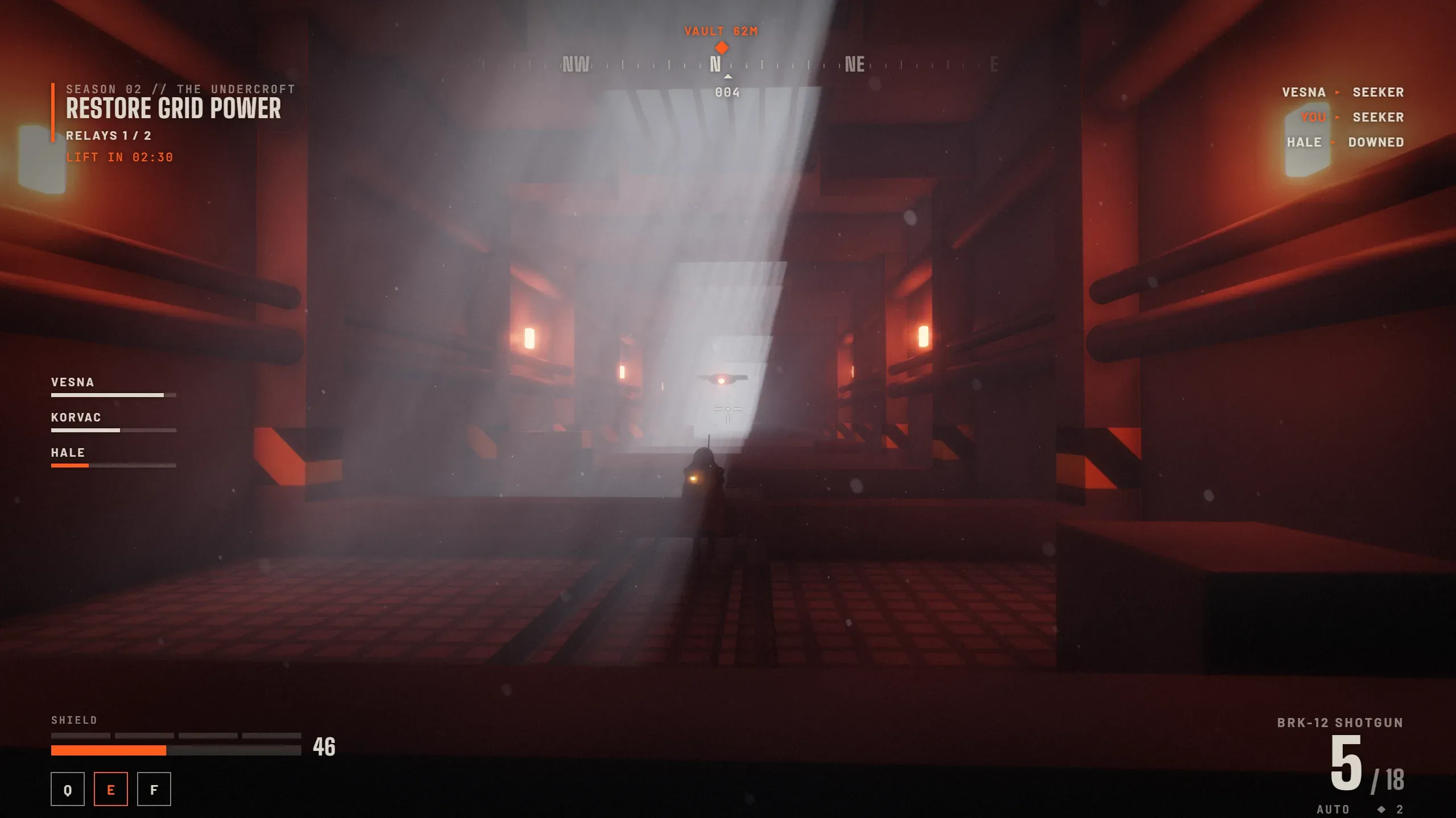 A Rogue aims down a red-lit service hall toward a Seeker drone, with the game HUD